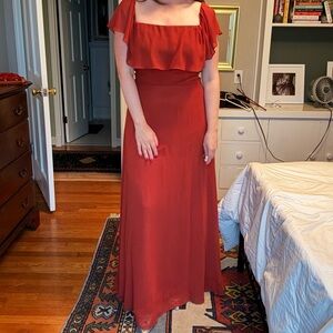 Burnt orange Bill Levkoff bridesmaid dress